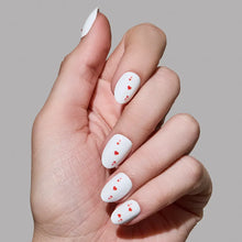 Ace of Hearts press-on nails in red and white heart design, stylish almond shape, product display photo from Love Notes colle