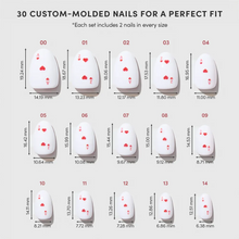 Ace of Hearts press-on nails in red heart design with love notes style, elegant nail set showcasing romantic nail art on hand