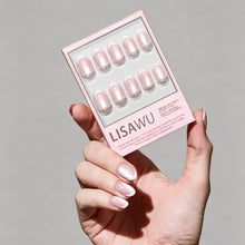 Angelic Touch press-on nails in soft pastel colors with almond shape and glossy finish on natural nails