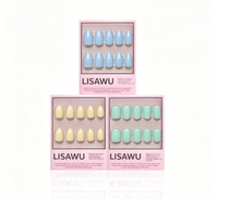 Anns Palette press-on nail set showcasing vibrant mixed color nail styles with glossy finish on almond-shaped nails