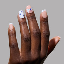 Blue A Kiss press-on nails in white shade