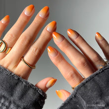 Candy Corn press-on nails in orange shade