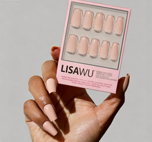 Exposed press-on nails in pink shade