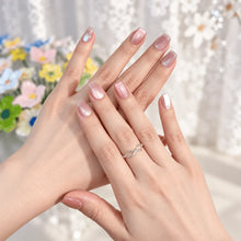 Close-up view of LISAWU First Love short square press-on nails showing the refined shape and delicate manicure details.