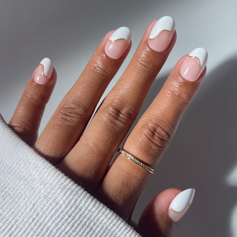 French Muse press-on nails in gold shade