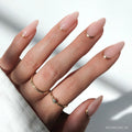 Goal Getter press-on nails in gold shade