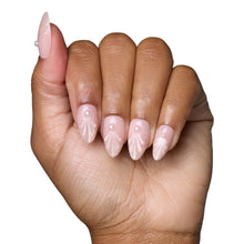 Honeymoon press-on nails set featuring elegant nude pink almond shape style perfect for weddings and romantic occasions