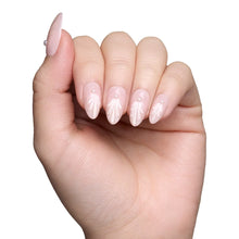 Honeymoon press-on nails set featuring elegant nude pink almond shape for a natural stylish look