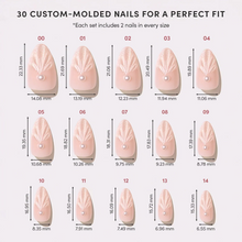 Honeymoon press-on nails featuring elegant soft pink almond-shaped nail set for a romantic style