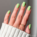 Light Sage press-on nails featuring soft muted green almond shape stylish nail set display