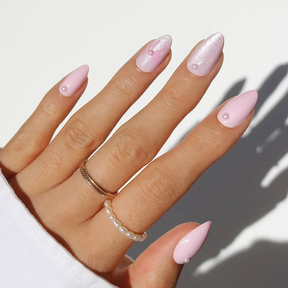 Love Knot press-on nails in elegant love notes design featuring intricate knot pattern stylish nail set on natural nails