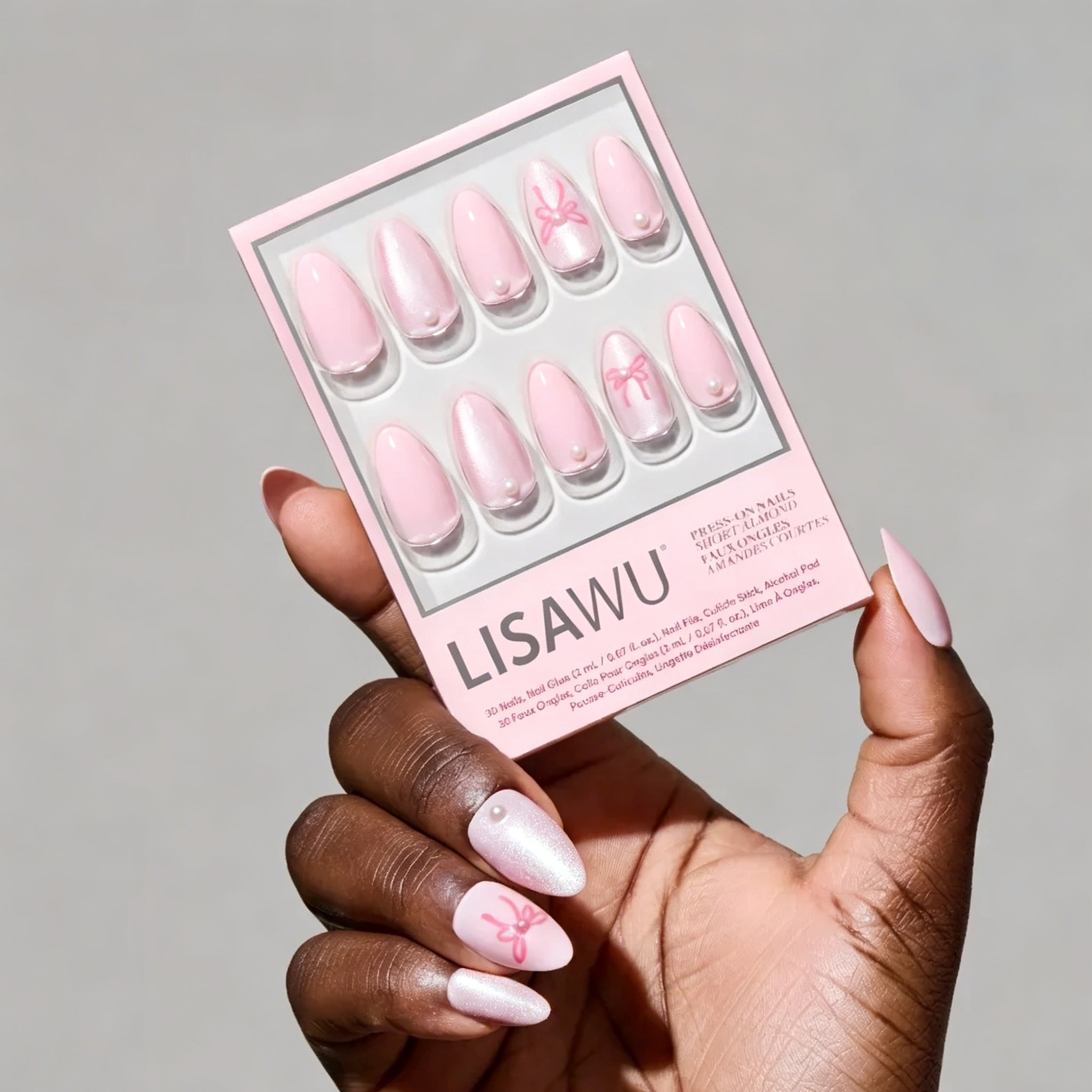 Love Knot press-on nails featuring elegant knot design in soft pink shades perfect for stylish nail set and trendy nail kit