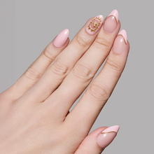 Lovers Crest press-on nails featuring elegant heart-shaped design in soft pink and red tones, stylish nail set display