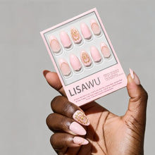 Lovers Crest press-on nails featuring elegant heart-shaped design in soft pink and red shades, stylish nail set for romantic