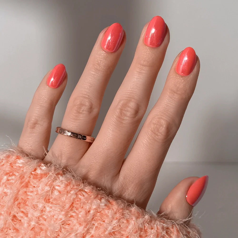 Lush Coral press-on nails in vibrant coral shade with glossy finish perfect for summer nail style and easy at-home nail kit a