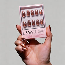 Magnetic Moscow press-on nails in orange shade