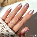 Oyster press-on nails in blue shade