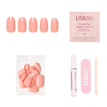 Peach Coral press-on nails in soft coral shade with glossy finish displayed on hand model