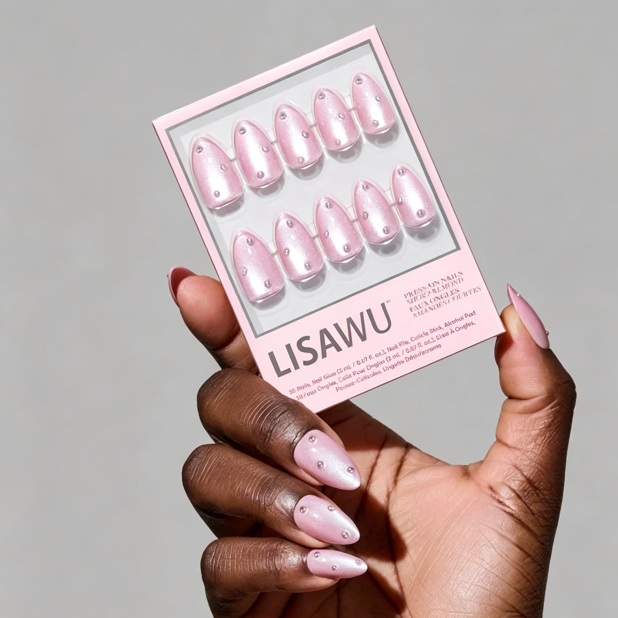 Pearl Me Softly press-on nails in soft pearl white color with an elegant rounded shape, stylish nail set for everyday wear