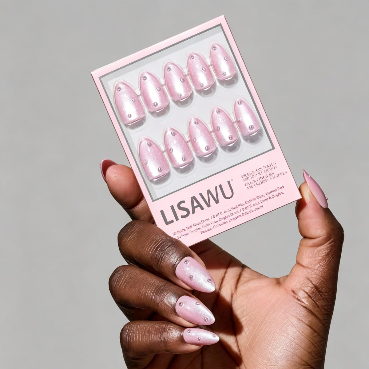 Pearl Me Softly press-on nails in soft pearl white color with an elegant rounded shape, stylish nail set for everyday wear