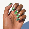 Peek-o’-Lantern press-on nails in black shade