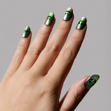 Peek-o’-Lantern press-on nails in silver shade