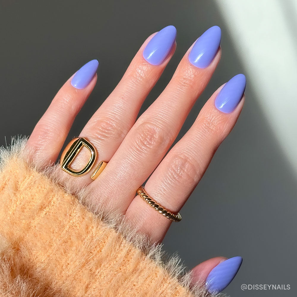 Periwinkle press-on nails in soft blue shade with glossy finish and almond shape perfect for stylish nail set