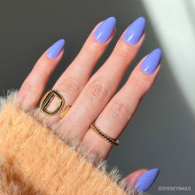 Periwinkle press-on nails in soft blue shade with glossy finish and almond shape perfect for stylish nail set