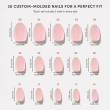 Pinch Me press-on nails showcasing soft pink almond-shaped nail set with glossy finish and subtle shimmer style