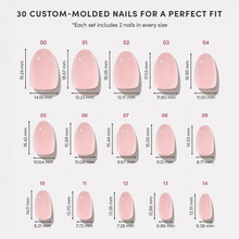 Pinch Me press-on nails showcasing soft pink almond-shaped nail set with glossy finish and subtle shimmer style