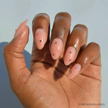 Pink Comet press-on nails in nude shade