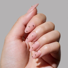 Pink Comet press-on nails in purple shade