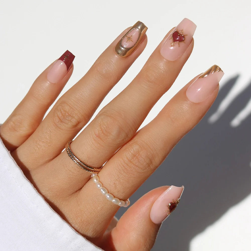 Queen of Hearts press-on nails in gold shade