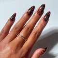 Rich Behavior press-on nails in black shade