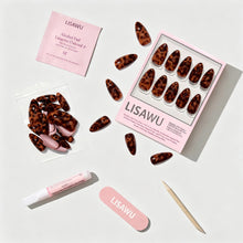Rich Behavior press-on nails in orange shade