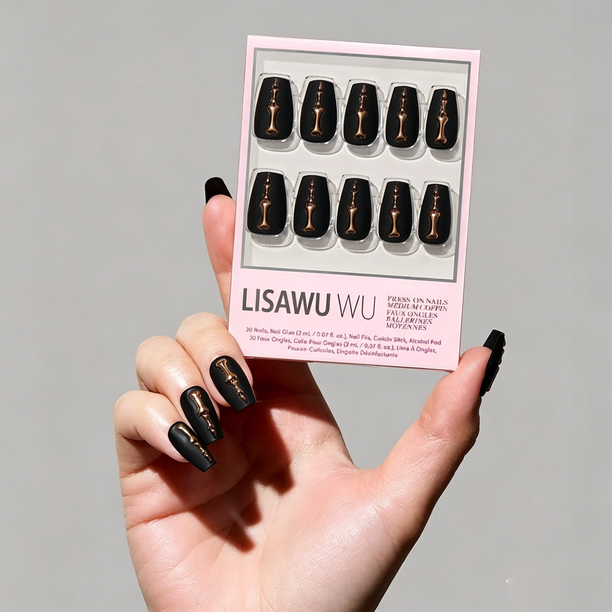 Rosy Remains press-on nails in gold shade