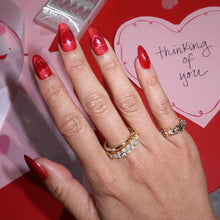 Sent with Love press-on nails in soft pink with heart accent, oval shape, elegant nail set perfect for Valentine’s Day look