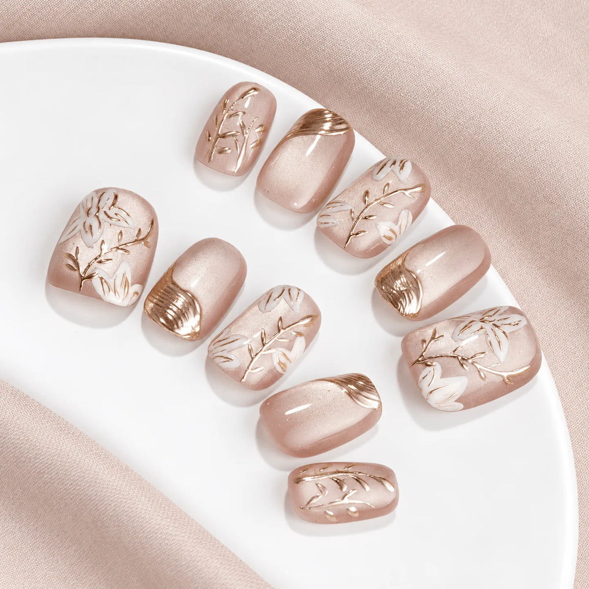 Easy-to-apply LISAWU Silver Crescent short oval press-on nails for a quick polished manicure at home.