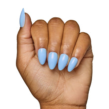 Soft Blue press-on nails in a soft pastel blue shade showcasing elegant almond nail shape style