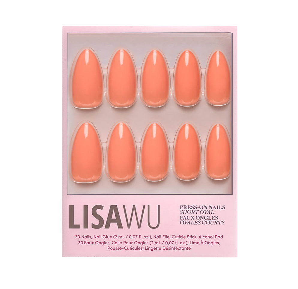 Soft Tangerine press-on nails in warm orange shade with glossy finish and natural rounded shape display