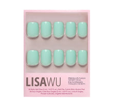 Soft teal press-on nails in a glossy finish showcasing elegant style and natural almond shape