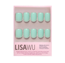 Soft teal press-on nails in a glossy finish showcasing elegant style and natural almond shape