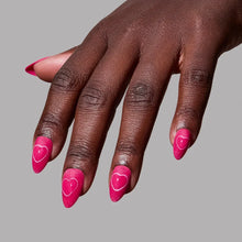 Text Me Back press-on nails set featuring glossy soft pink almond-shaped nails styled on natural hands