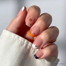 Tiny Pumpkin press-on nails in black shade