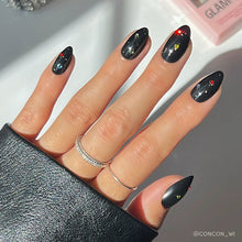 Winter Comet press-on nails in black shade